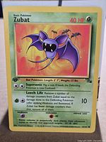 Front of Zubat 1st Edition Fossil card showing artwork, set symbol and 57/62 numbering