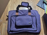 Front view of both bags, smaller Yarwo attached to larger Luxja