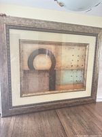 full view of framed abstract print