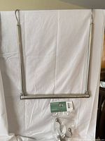 Rod and packaged hook displayed together