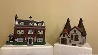 Front view of both ceramic village buildings together