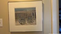 Full framed artwork on wall showing frame and mat