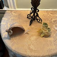 Both hats on tabletop showing overall forms and scale