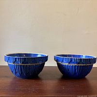 Both bowls side by side showing exterior glaze and ribbed texture