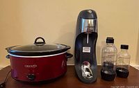 Crock-Pot slow cooker, SodaStream maker, three bottles