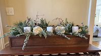 Front view of full wooden box centerpiece