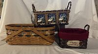 All three woven holiday baskets grouped to show size, colors, liners, and ceramic tile details