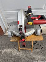 Top view of Craftsman miter saw showing handle, laser indicator, and miter scale