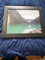 Front view of framed photograph showing image and frame style