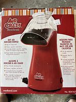 Front of retail box showing red Air Crazy popcorn popper