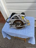 Left side view showing Mastercraft Maximum branding, blade, guard and laser module