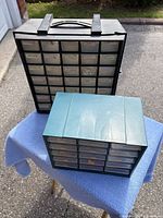 Both organizers side by side showing size comparison and overall condition