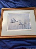 Framed print showing full artwork with mat and frame