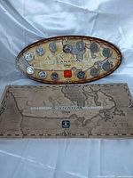 Full 1999 Millennium coin set with oval display and sleeve