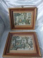 Both framed Anton Pieck relief panels front view