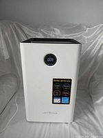 Front view showing overall unit with cord