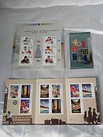 Overview of three Canada Post stamp items: hockey legends sheet, sealed hockey pack, travel poster booklet