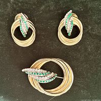 Brooch and both earrings front view