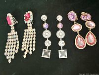 All three pairs of earrings displayed side by side