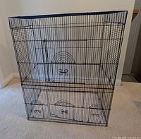 Front view of full metal bird cage