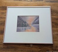 Framed landscape watercolour print with cream mat and rose-gold frame