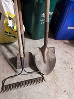 Group shot of shovel, spade, rake showing full length and condition