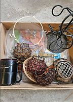 Overview of lot showing coffee maker, three tea light holders, microwave plate