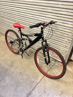 Full view of black/red mountain bike
