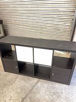 Front view showing 8-cube configuration and white accent panels