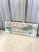 Front view showing design and lettering