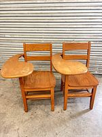 Both wooden school desk chairs side by side showing overall style and tablets