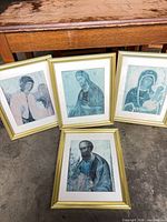 All four framed icon prints arranged together
