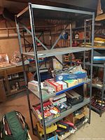Full view of metal shelving unit loaded with contents (not included)
