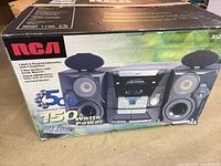 Front of original box showing stereo system features and image