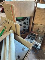 EICO Model 460 oscilloscope partially in box with other instruments