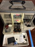 Full view of organizer with drawers open showing tubes and parts