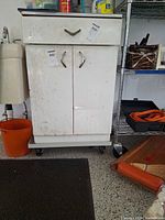 Front view of cabinet on dolly showing overall structure