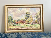 Front view of framed watercolor landscape