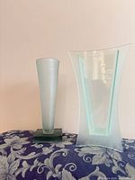 pair of frosted seafoam vases side by side
