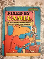 Front cover displaying title, author, illustrator, series logo