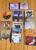 All CDs laid out showing covers and discs