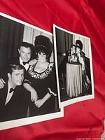 Both photographs displayed on red cloth