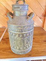 Full view of Amoco 5-gallon metal jug