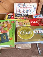 Overview of six boxed games on table