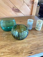 All four items: two green glass vases and two sugar-frosted candle holders