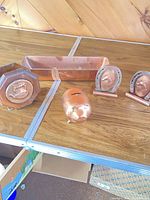 All five copper items on tabletop