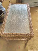Top view showing rectangular faux wicker frame and textured glass inset