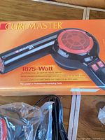 Retail box showing Curlmaster 1875-watt hair dryer