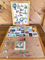 Overall view of both boards showing magnets, cork surface, push pins