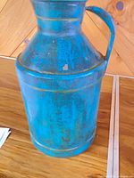 Full view of antiqued blue metal jug